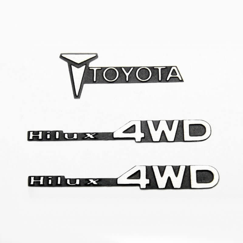 image RC4WD 1/10 METAL EMBLEM FOR TAMIYA HILUX - Image 1