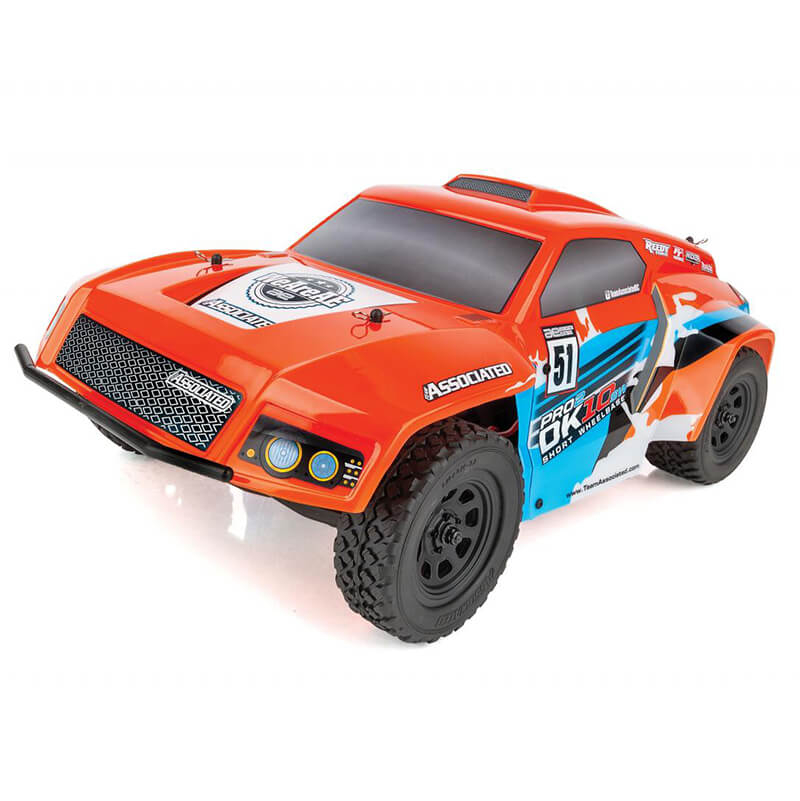 image TEAM ASSOCIATED PRO2 DK10SW DAKAR 1/10 BUGGY RTR ORAN/BLUE - Image 1